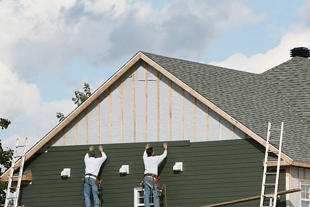 Professional Siding technician working in Akron, PA